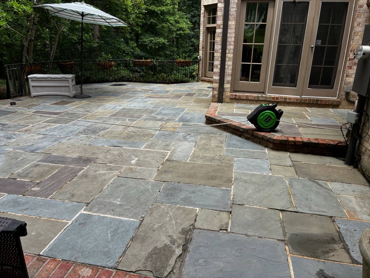 Flagstone patio spotless after power washing